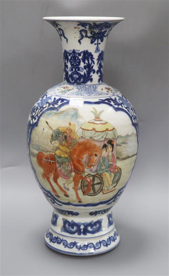 A Chinese blue and white baluster vase, with a polychrome painted panel height 47cm